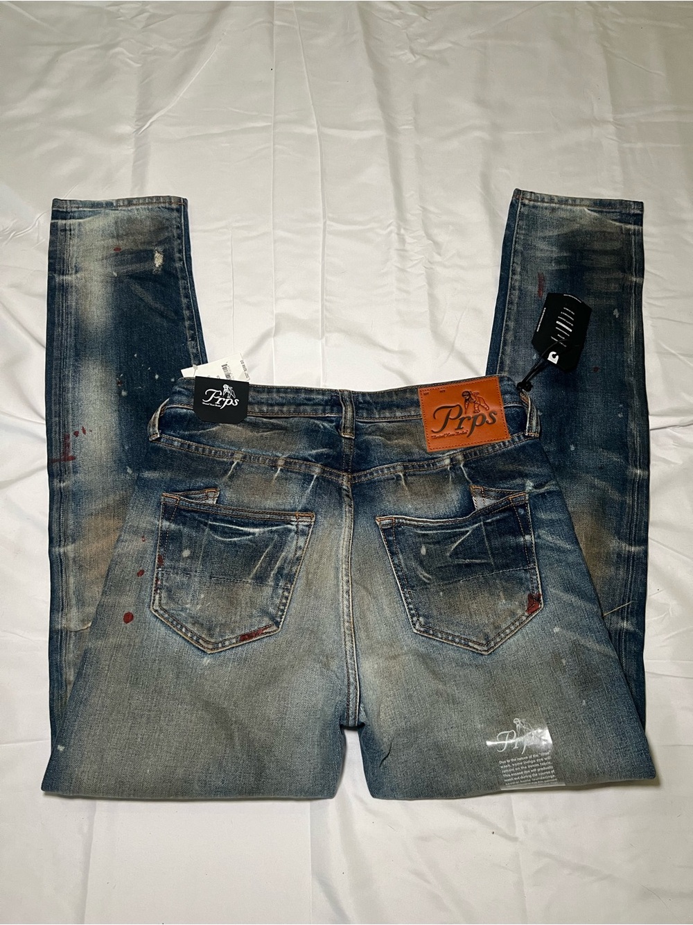 PRPS Men’s Washed Blue Skinny Jeans with Distressed Detailing